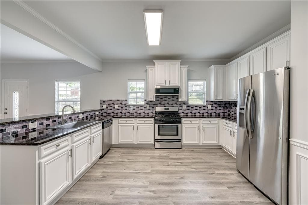 5 bedroom, 4 bathroom, 4,035 sq ft single family residence for sale at 3772 SUNBRIDGE Drive, Snellville, GA 30039 — photo 7