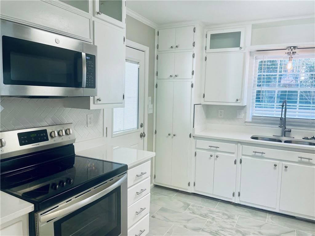 4 bedroom, 3 bathroom, 1,727 sq ft single family residence for rent at 471 Village Green Court, Lilburn, GA 30047 for $2,399 a month — photo 3