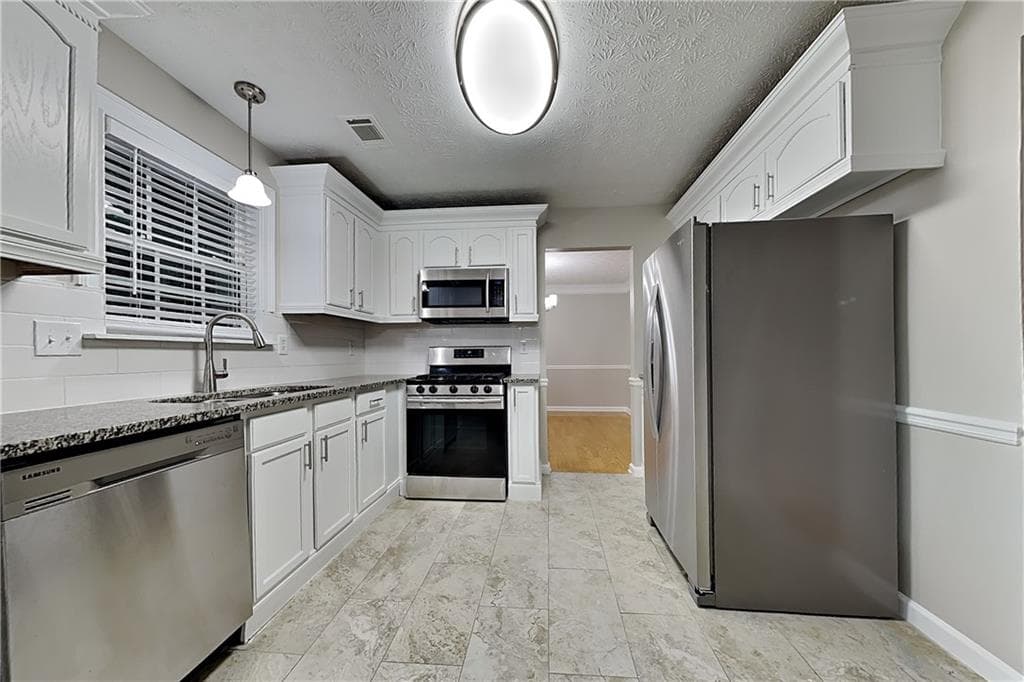 4 bedroom, 3 bathroom, 2,258 sq ft single family residence for rent at 3603 Stephens Creek Court, Loganville, GA 30052 for $2,500 a month — photo 4