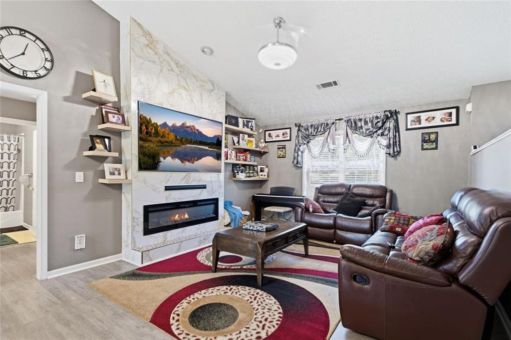 5 bedroom, 3 bathroom, 3,758 sq ft single family residence for sale at 2748 Victoria Woods Court, Buford, GA 30519 — photo 4