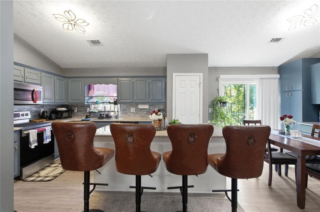 5 bedroom, 3 bathroom, 3,758 sq ft single family residence for sale at 2748 Victoria Woods Court, Buford, GA 30519 — photo 5