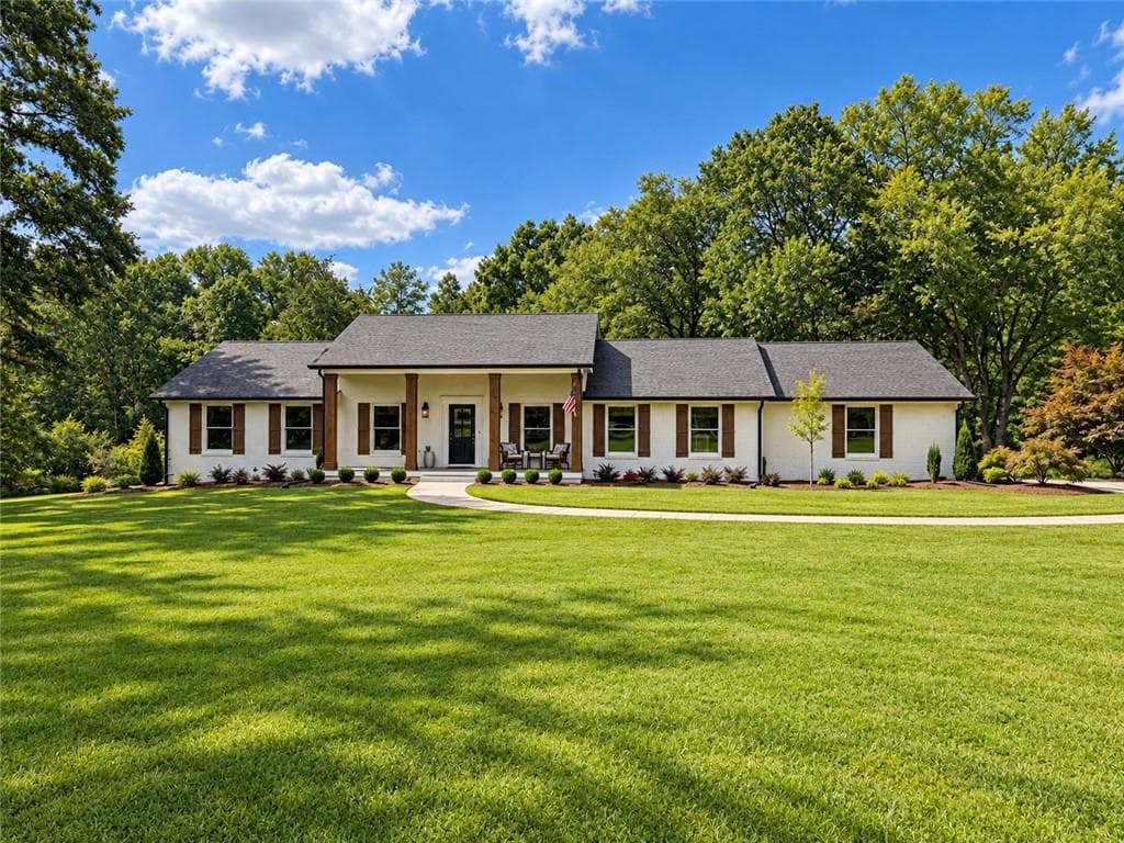 5 bedroom, 3 bathroom, 4,007 sq ft single family residence for sale at 1209-2 Couty Line Road, Cumming, GA 30040 — photo 1 of 25