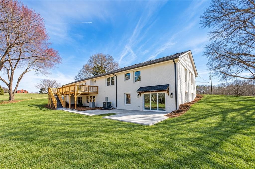 5 bedroom, 3 bathroom, 4,007 sq ft single family residence for sale at 1209-2 Couty Line Road, Cumming, GA 30040 — photo 3