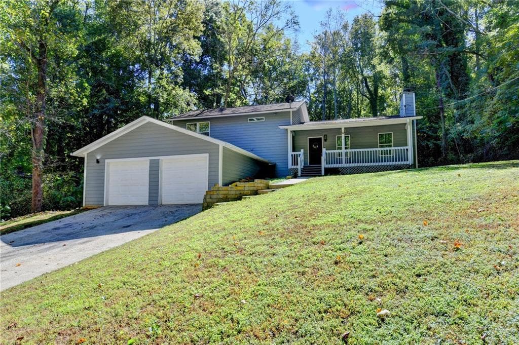 5 bedroom, 3 bathroom, 1,968 sq ft single family residence for sale at 236 Hazel Street, Lithia Springs, GA 30122 — photo 4