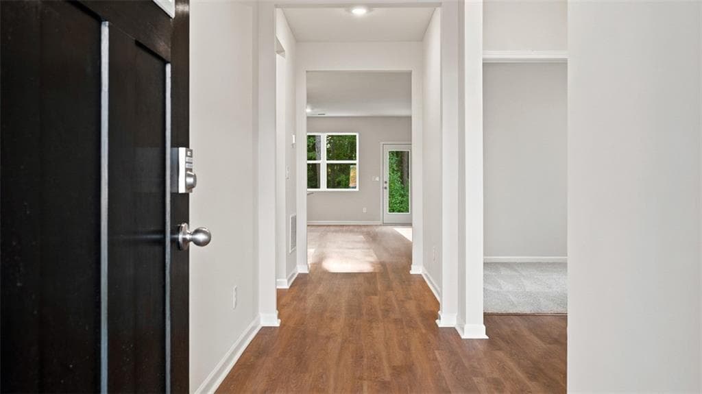3 bedroom, 2 bathroom, 1,714 sq ft single family residence for sale at 8571 Secretariat Drive, Lithonia, GA 30058 — photo 3