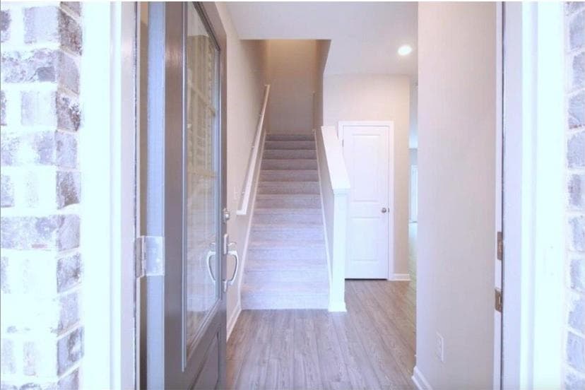 3 bedroom, 3 bathroom, 1,882 sq ft townhouse for rent at 6148 Lanier Harbor Landing, Buford, GA 30518 for $2,600 a month — photo 2