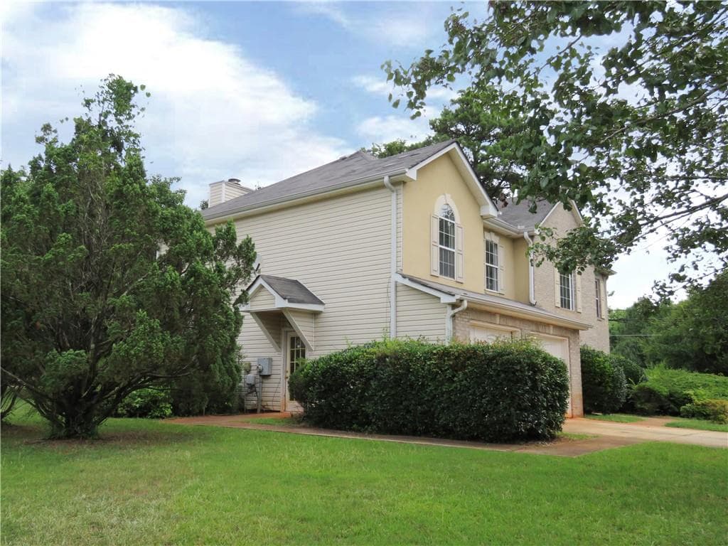 4 bedroom, 3 bathroom, 2,656 sq ft single family residence for sale at 4057 Stonington Trace, Ellenwood, GA 30294 — photo 2