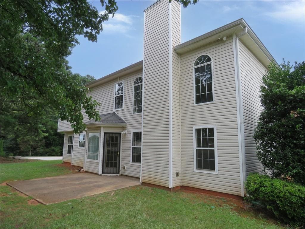 4 bedroom, 3 bathroom, 2,656 sq ft single family residence for sale at 4057 Stonington Trace, Ellenwood, GA 30294 — photo 4