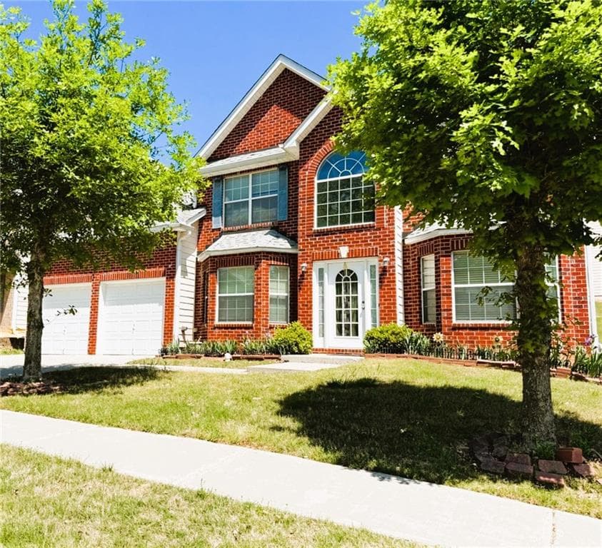 5 bedroom, 3 bathroom, 3,377 sq ft single family residence for sale at 1825 Lily Stem Trail, Auburn, GA 30011 — photo 1 of 21