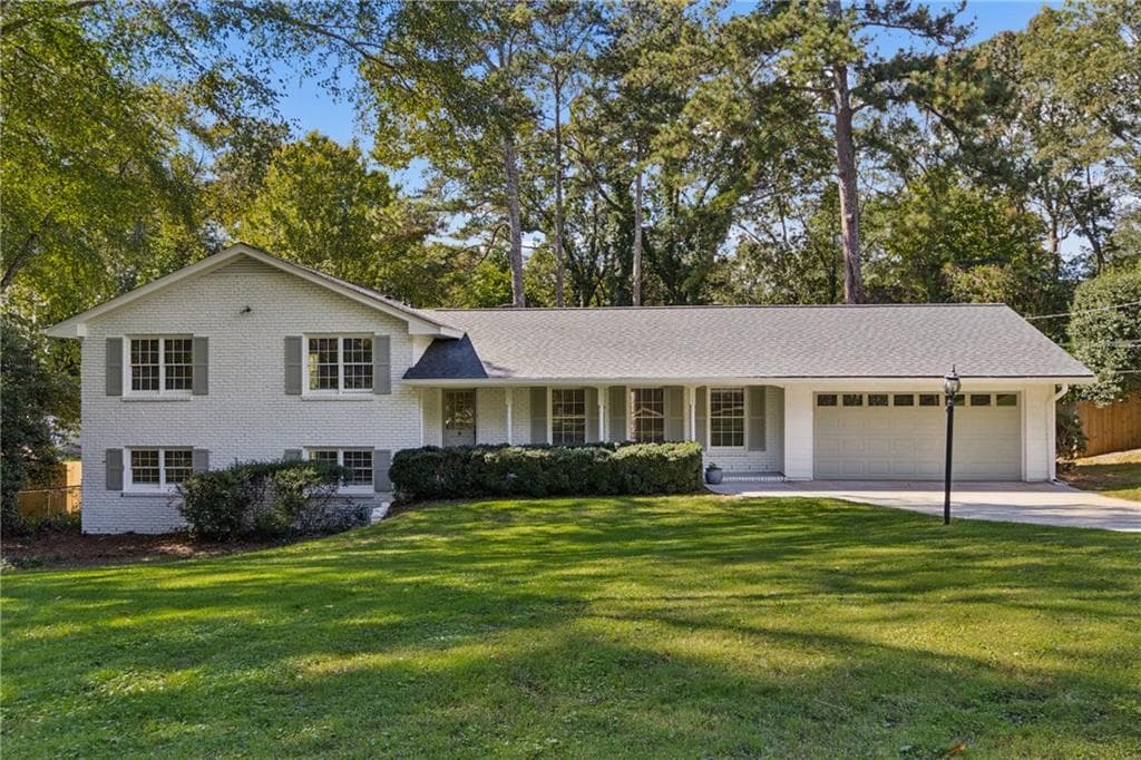 4 bedroom, 3 bathroom, 2,436 sq ft single family residence for sale at 1424 Cedarhurst Drive, Dunwoody, GA 30338