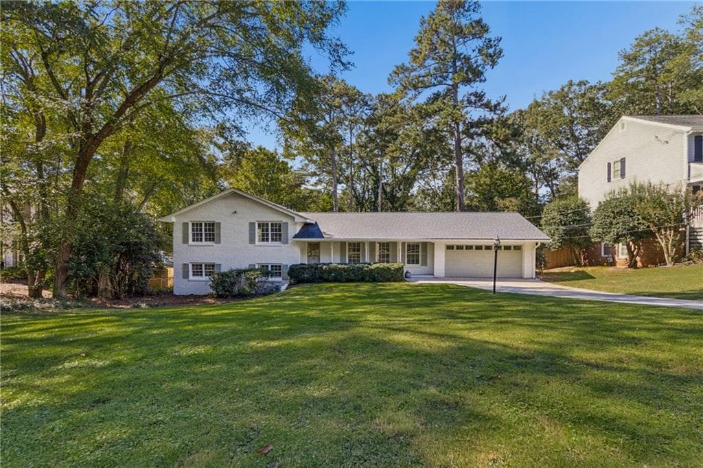 4 bedroom, 3 bathroom, 2,436 sq ft single family residence for sale at 1424 Cedarhurst Drive, Dunwoody, GA 30338 — photo 7