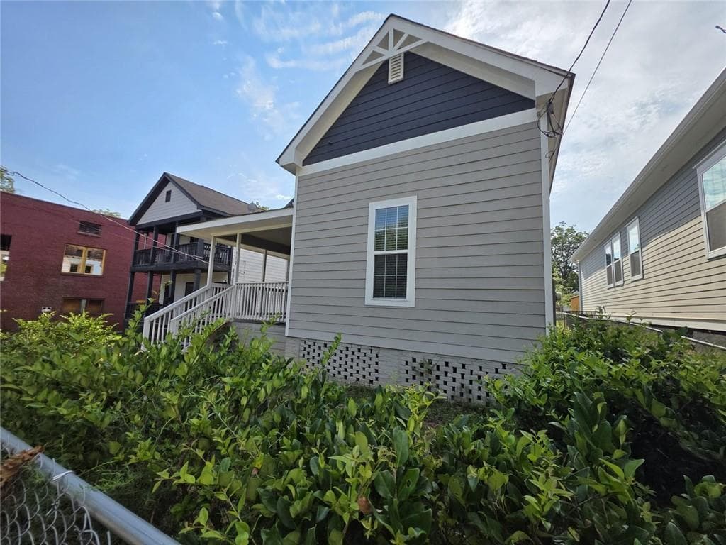 4 bedroom, 2 bathroom, 1,529 sq ft single family residence for sale at 510 James P Brawley Drive, Atlanta, GA 30318 — photo 2