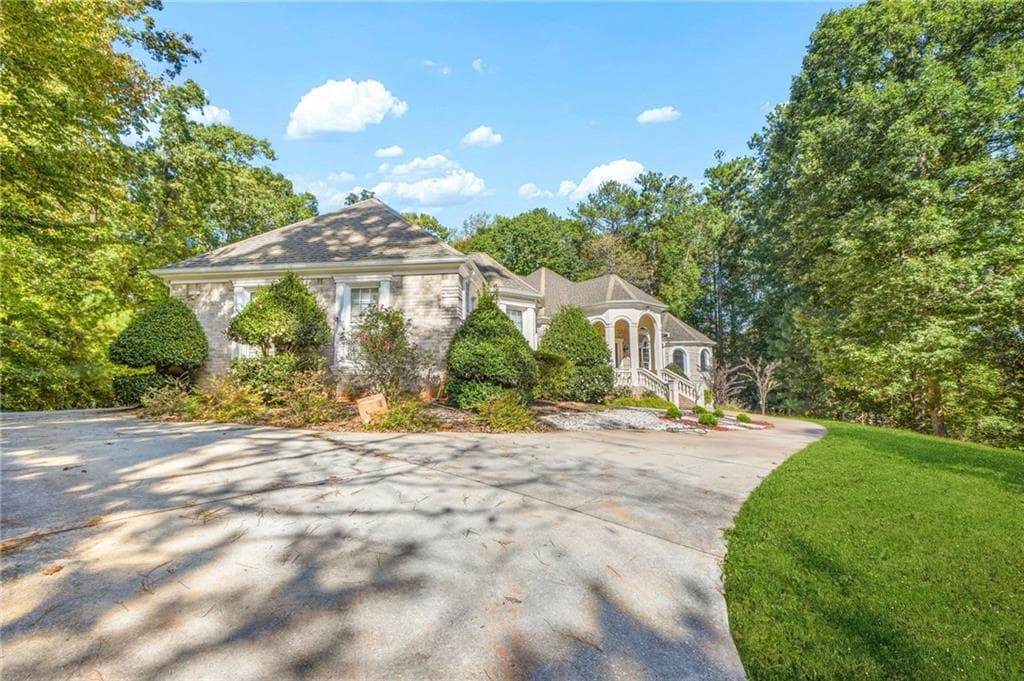 5 bedroom, 7 bathroom, 7,794 sq ft single family residence for sale at 1565 Mountain Shadow Trail, Stone Mountain, GA 30087 — photo 2