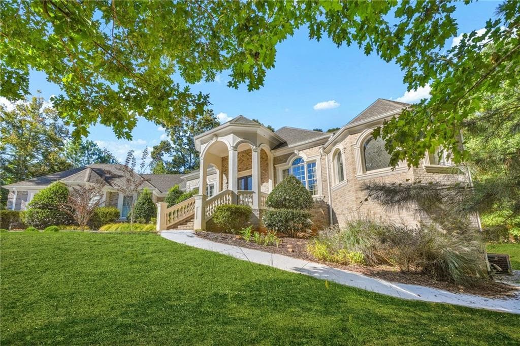 5 bedroom, 7 bathroom, 7,794 sq ft single family residence for sale at 1565 Mountain Shadow Trail, Stone Mountain, GA 30087 — photo 3