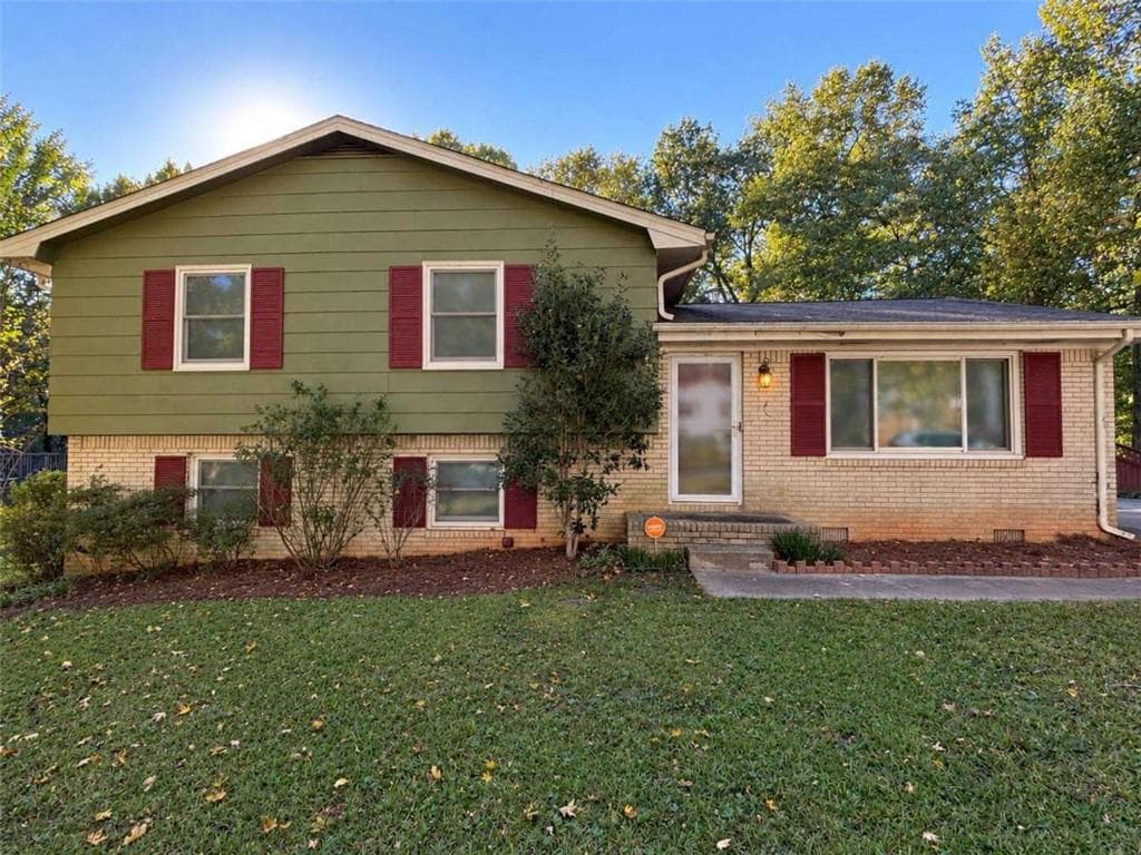 4 bedroom, 3 bathroom, 2,039 sq ft single family residence for sale at 8321 Magnolia Drive, Jonesboro, GA 30238