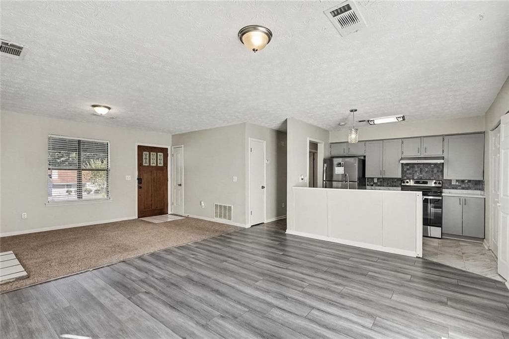 3 bedroom, 2 bathroom, 1,128 sq ft single family residence for sale at 694 Waterview Drive, Riverdale, GA 30274 — photo 4