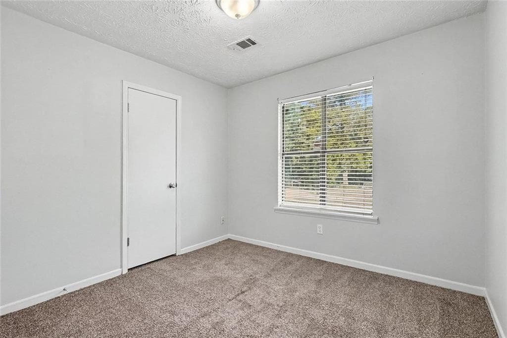 3 bedroom, 2 bathroom, 1,128 sq ft single family residence for sale at 694 Waterview Drive, Riverdale, GA 30274 — photo 8