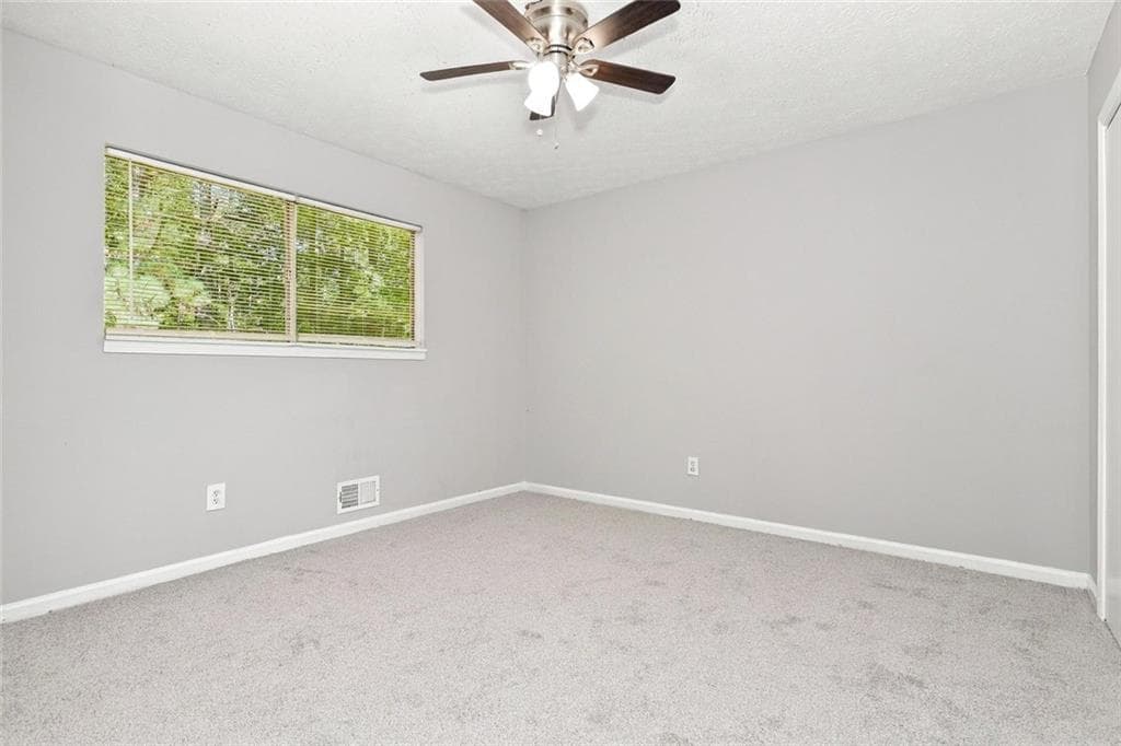 3 bedroom, 3 bathroom, 1,513 sq ft single family residence for sale at 2472 Hartford Drive, Ellenwood, GA 30294 — photo 2