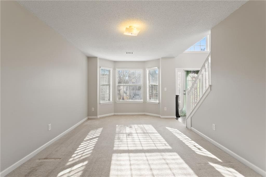 5 bedroom, 3 bathroom, 3,377 sq ft single family residence for sale at 1825 Lily Stem Trail, Auburn, GA 30011 — photo 2