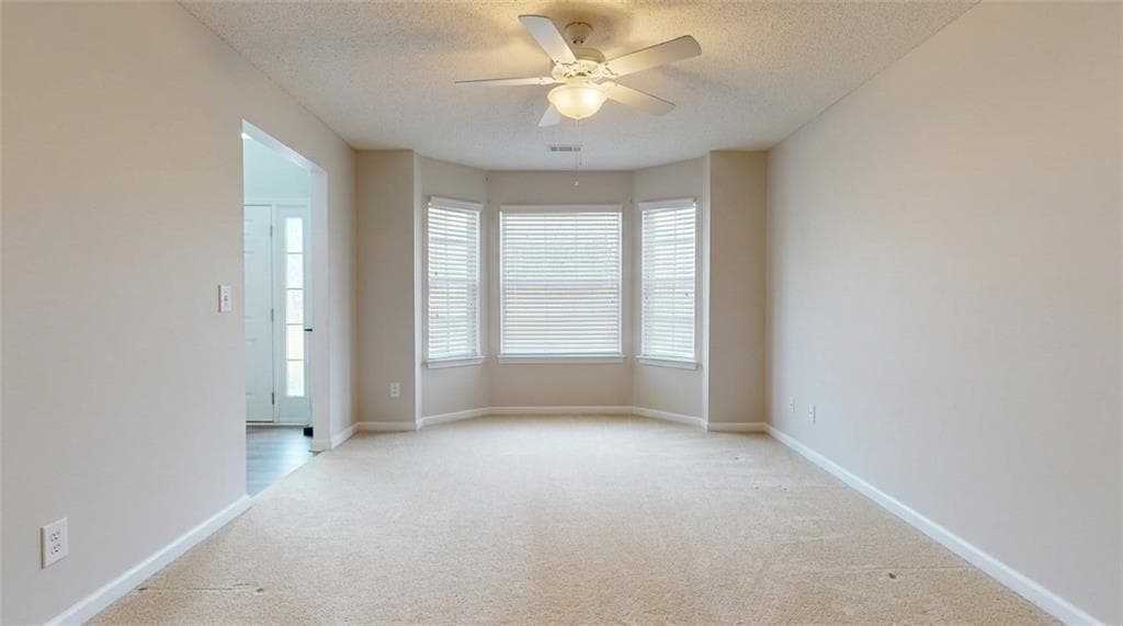 5 bedroom, 3 bathroom, 3,377 sq ft single family residence for sale at 1825 Lily Stem Trail, Auburn, GA 30011 — photo 4