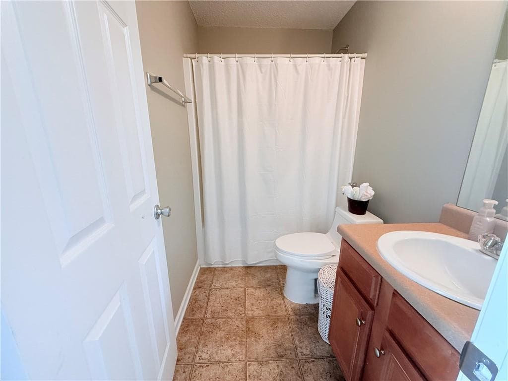 5 bedroom, 3 bathroom, 3,377 sq ft single family residence for sale at 1825 Lily Stem Trail, Auburn, GA 30011 — photo 6