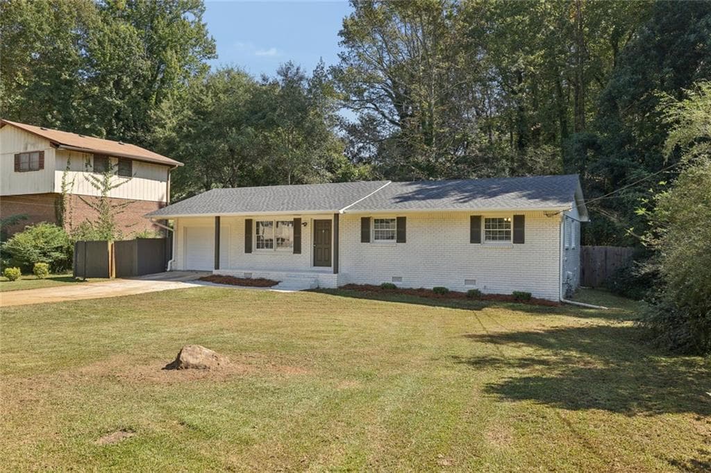 3 bedroom, 3 bathroom, 1,204 sq ft single family residence for sale at 719 San Miguel Drive, Stone Mountain, GA 30083 — photo 2