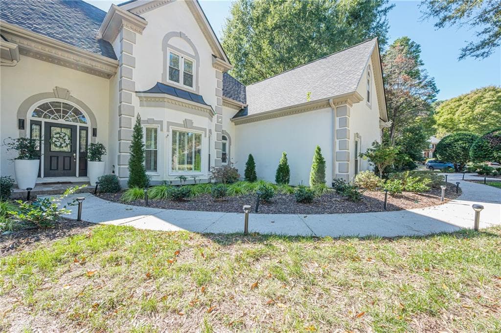 7 bedroom, 7 bathroom, 7,030 sq ft single family residence for sale at 125 W Meadows Court, Johns Creek, GA 30005 — photo 2