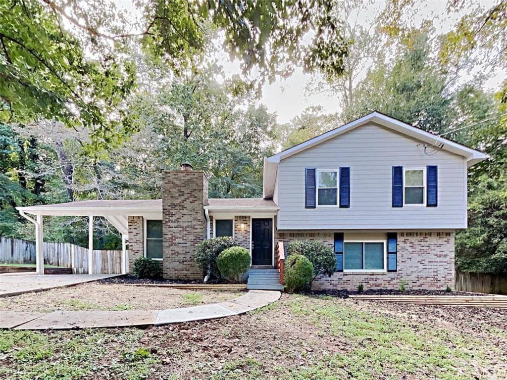 4 bedroom, 3 bathroom, 1,864 sq ft single family residence for sale at 322 Hardwood Lane, Lawrenceville, GA 30044 — photo 1 of 23