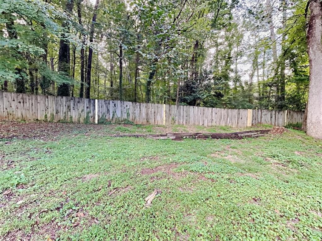 4 bedroom, 3 bathroom, 1,864 sq ft single family residence for sale at 322 Hardwood Lane, Lawrenceville, GA 30044 — photo 3
