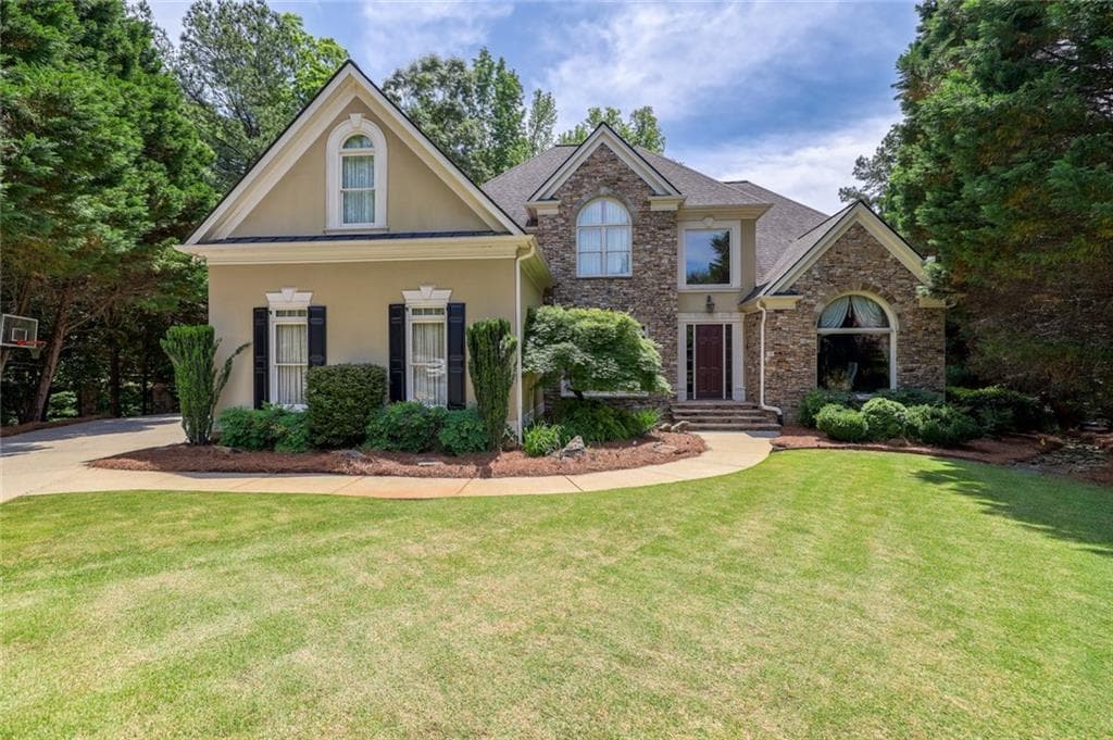 5 bedroom, 7 bathroom, 4,731 sq ft single family residence for sale at 710 Henley Fields Circle, Johns Creek, GA 30097