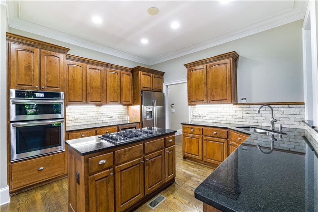 5 bedroom, 7 bathroom, 4,731 sq ft single family residence for sale at 710 Henley Fields Circle, Johns Creek, GA 30097 — photo 6