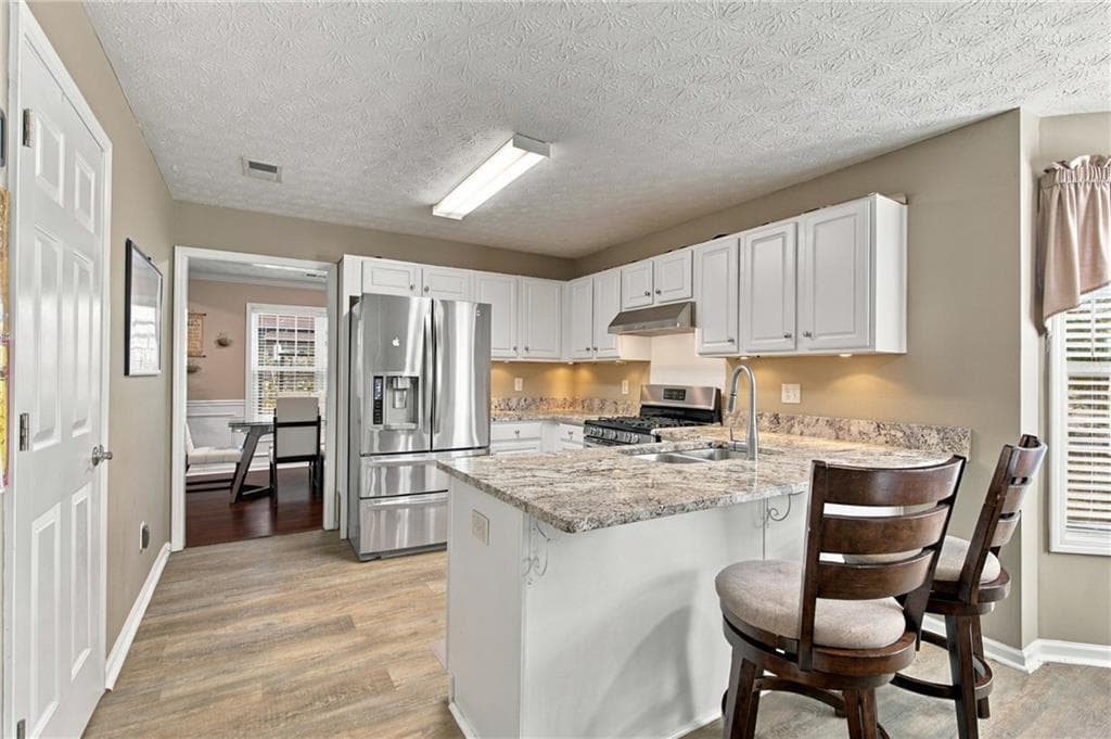 3 bedroom, 2 bathroom, 1,712 sq ft single family residence for sale at 2353 Radcliff Drive, Lawrenceville, GA 30043 — photo 6