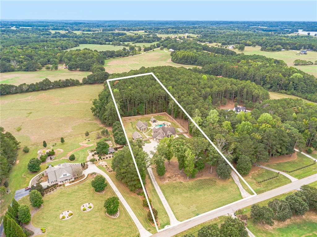 5 bedroom, 4 bathroom, 4,722 sq ft single family residence for sale at 1825 Covenant Trail, Monroe, GA 30655 — photo 2
