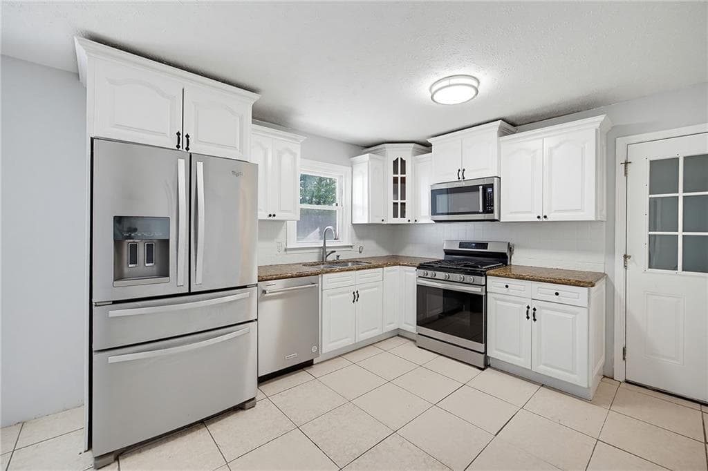 3 bedroom, 2 bathroom, 1,576 sq ft single family residence for sale at 4034 Weeks Drive, Kennesaw, GA 30144 — photo 6