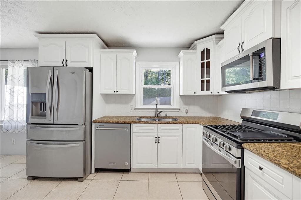 3 bedroom, 2 bathroom, 1,576 sq ft single family residence for sale at 4034 Weeks Drive, Kennesaw, GA 30144 — photo 7