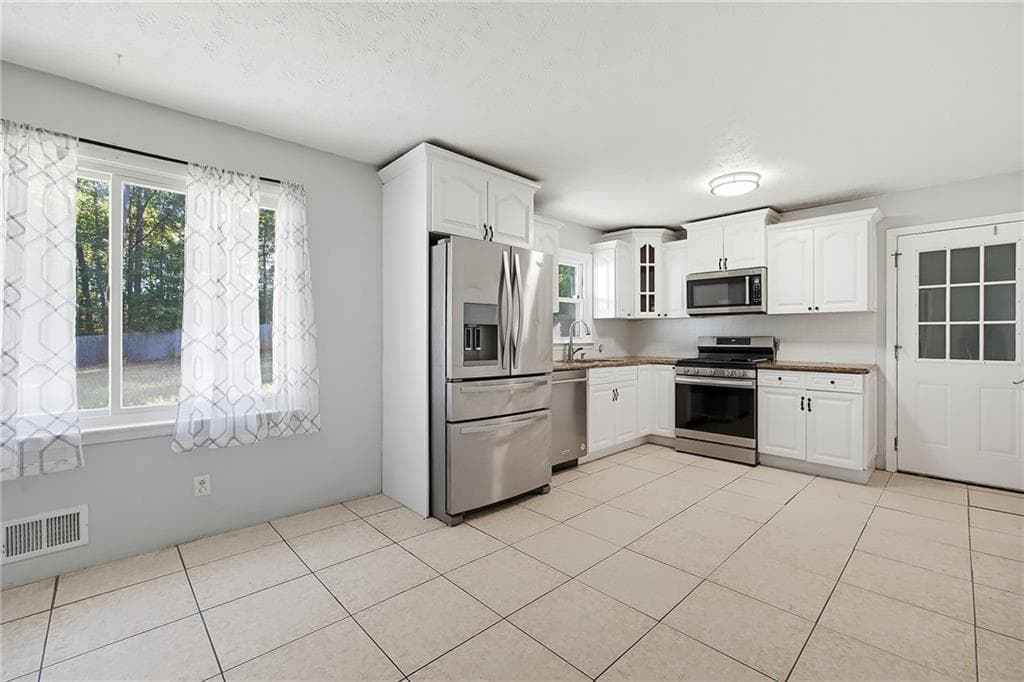 3 bedroom, 2 bathroom, 1,576 sq ft single family residence for sale at 4034 Weeks Drive, Kennesaw, GA 30144 — photo 9