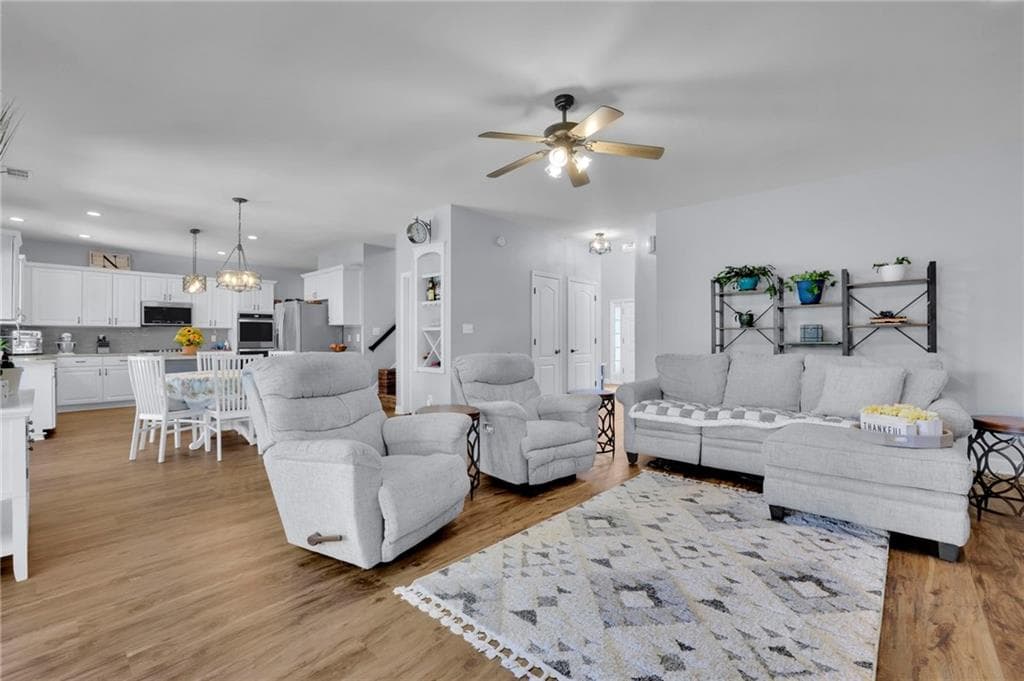 4 bedroom, 3 bathroom, 3,173 sq ft single family residence for sale at 5061 Tottenham Court, Suwanee, GA 30024 — photo 6