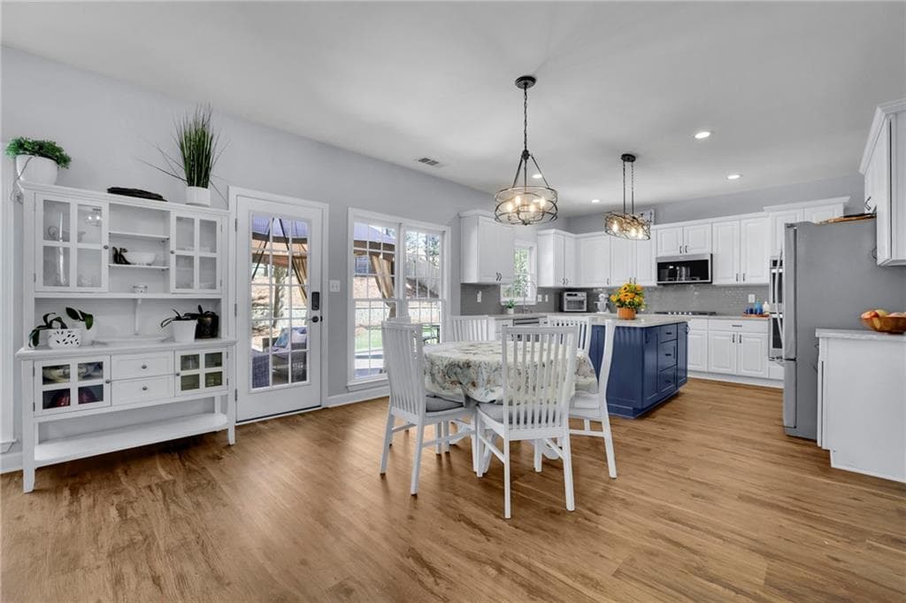 4 bedroom, 3 bathroom, 3,173 sq ft single family residence for sale at 5061 Tottenham Court, Suwanee, GA 30024 — photo 7