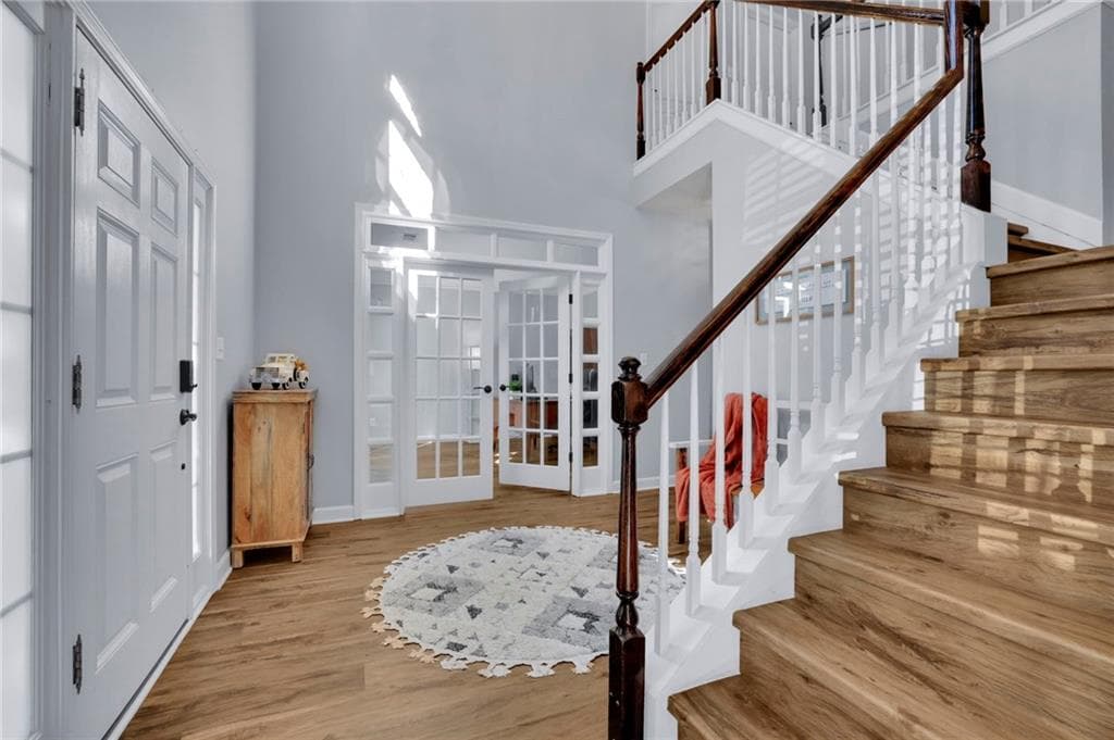 4 bedroom, 3 bathroom, 3,173 sq ft single family residence for sale at 5061 Tottenham Court, Suwanee, GA 30024 — photo 4