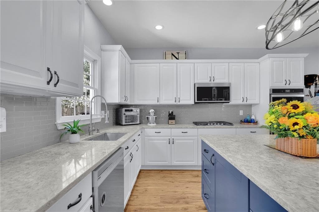 4 bedroom, 3 bathroom, 3,173 sq ft single family residence for sale at 5061 Tottenham Court, Suwanee, GA 30024 — photo 10