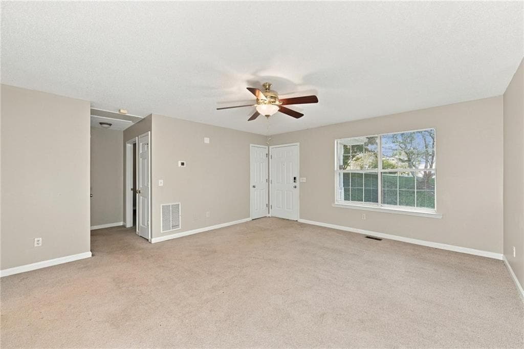 4 bedroom, 3 bathroom, 2,079 sq ft single family residence for sale at 6429 River Hill Drive, Flowery Branch, GA 30542 — photo 4