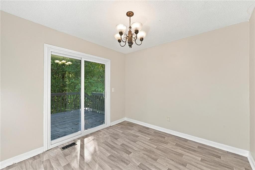 4 bedroom, 3 bathroom, 2,079 sq ft single family residence for sale at 6429 River Hill Drive, Flowery Branch, GA 30542 — photo 6