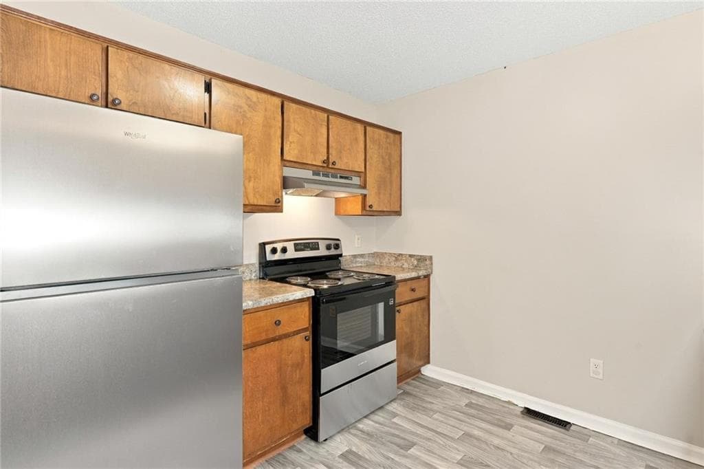 4 bedroom, 3 bathroom, 2,079 sq ft single family residence for sale at 6429 River Hill Drive, Flowery Branch, GA 30542 — photo 7
