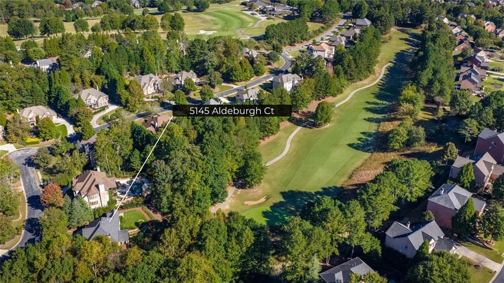 5 bedroom, 8 bathroom, 6,045 sq ft single family residence for sale at 5145 Aldeburgh Court, Suwanee, GA 30024 — photo 4