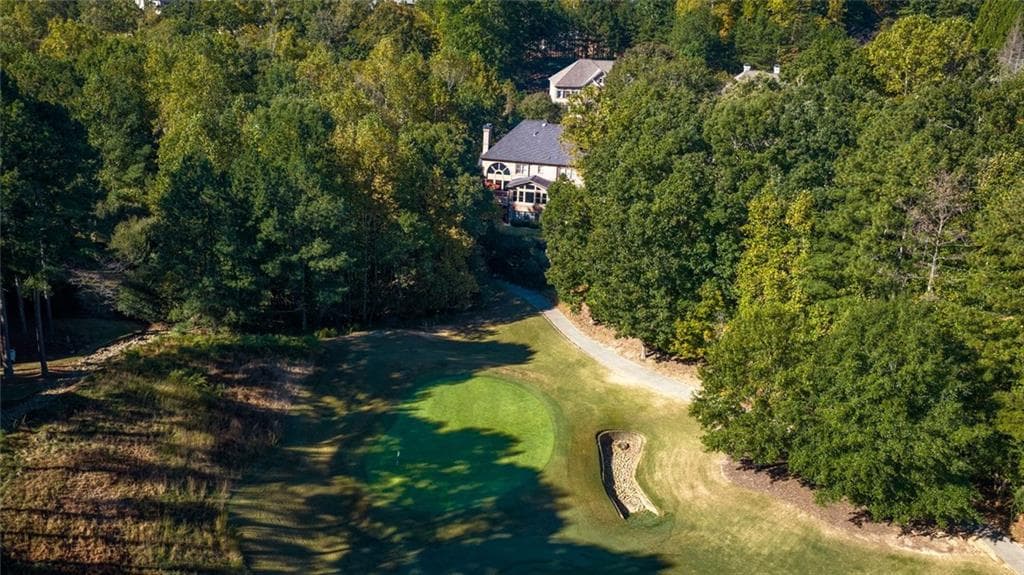 5 bedroom, 8 bathroom, 6,045 sq ft single family residence for sale at 5145 Aldeburgh Court, Suwanee, GA 30024 — photo 5