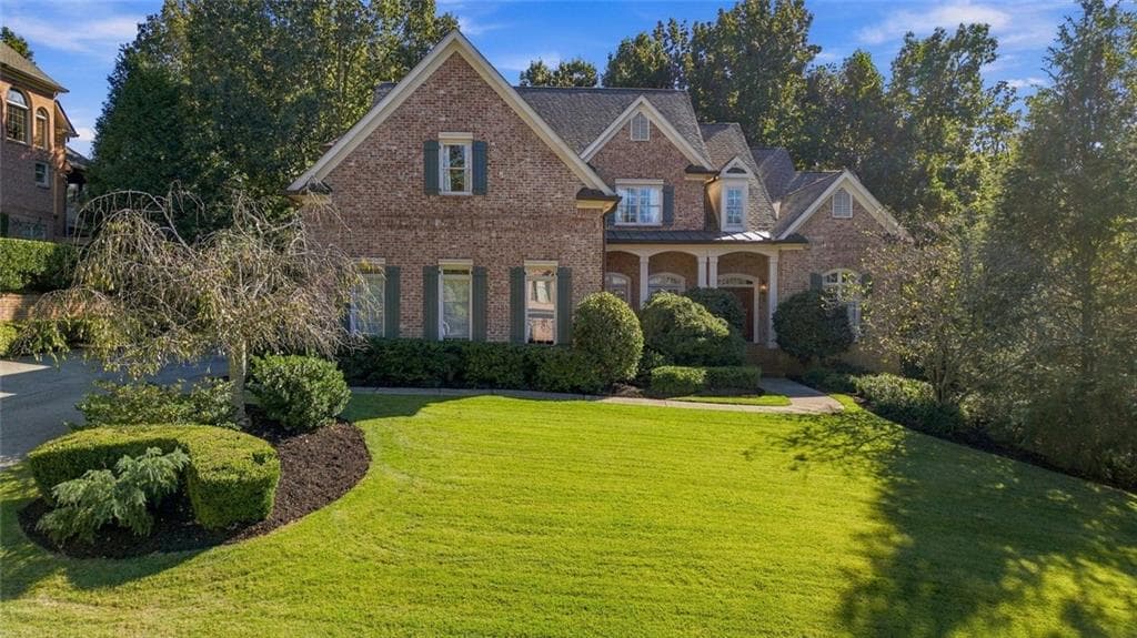 5 bedroom, 6 bathroom, 6,013 sq ft single family residence for sale at 9055 Bedford Way, Suwanee, GA 30024 — photo 1 of 62