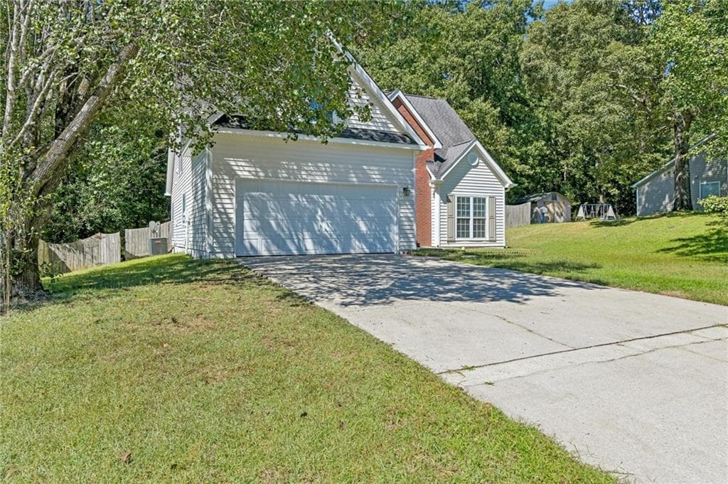 4 bedroom, 3 bathroom, 1,906 sq ft single family residence under contract at 206 Northwind Drive, Stockbridge, GA 30281 — photo 2
