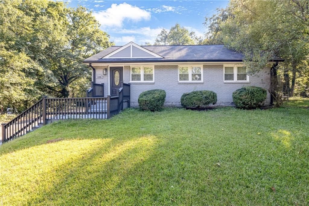 3 bedroom, 2 bathroom, 1,700 sq ft single family residence for sale at 2105 S Stone Mountain Lithonia Road, Lithonia, GA 30058