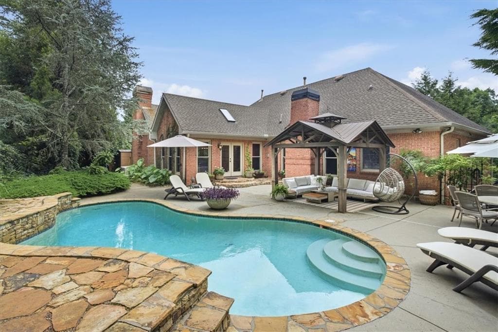 4 bedroom, 4 bathroom, 4,416 sq ft single family residence for sale at 4900 Walnut Grove, Johns Creek, GA 30022 — photo 2
