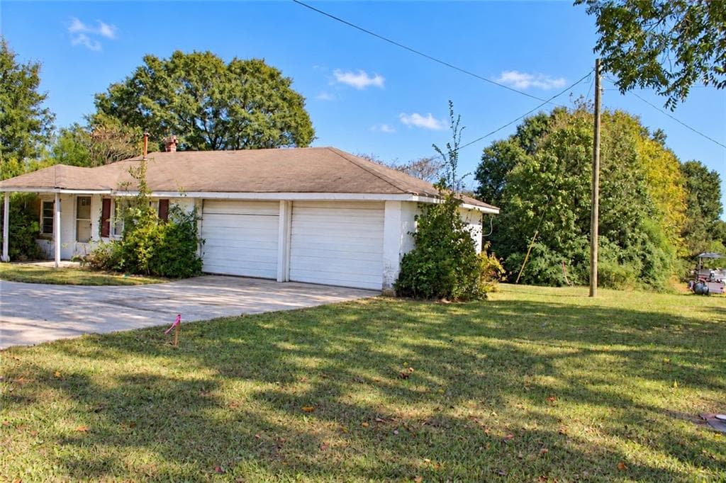 2 bedroom, 1 bathroom, 725 sq ft single family residence for sale at 1346 Lester Road, Conyers, GA 30012 — photo 2